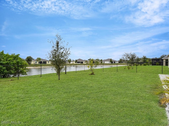 view of yard with a water view