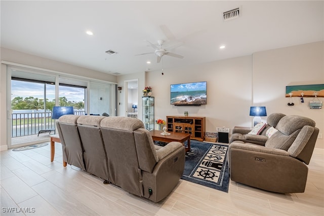 living room featuring ceiling fan