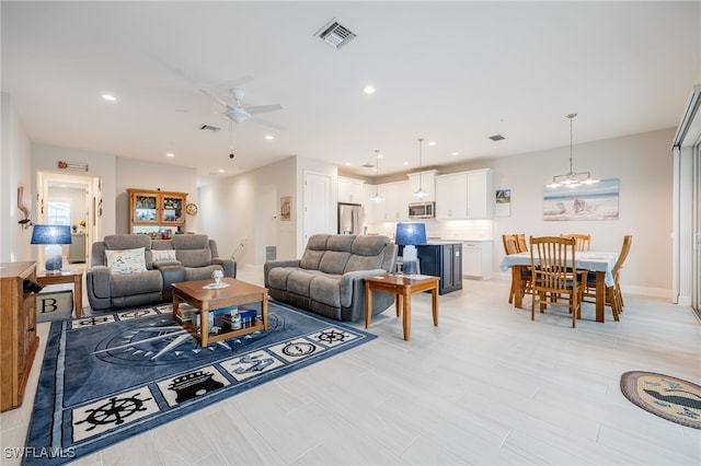 living room with ceiling fan