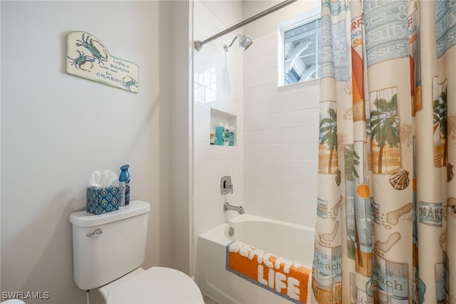 bathroom featuring toilet and shower / bathtub combination with curtain