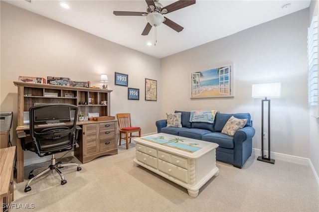 office featuring ceiling fan and light colored carpet