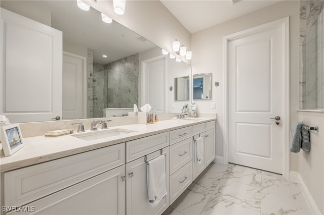 bathroom with walk in shower and vanity