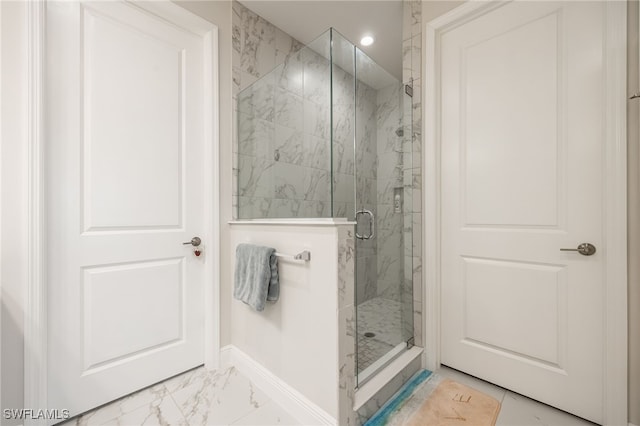 bathroom featuring an enclosed shower