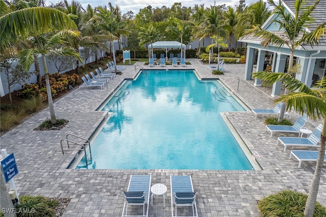 view of pool with a patio area and a gazebo