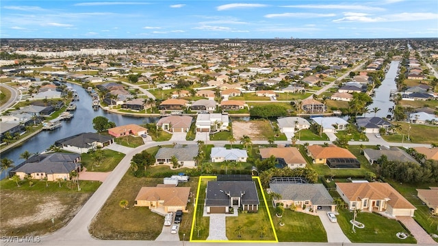 bird's eye view with a water view