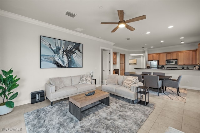 tiled living room with crown molding and ceiling fan