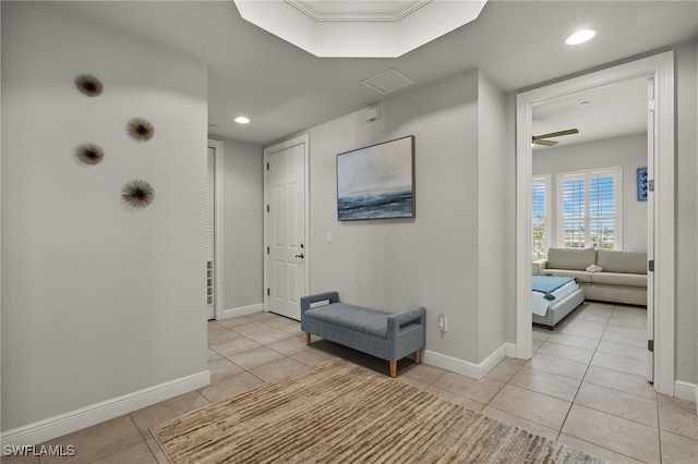 hallway with light tile patterned floors