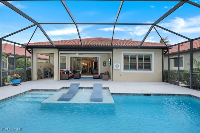 rear view of house featuring a lanai, ceiling fan, an outdoor living space, and a patio area