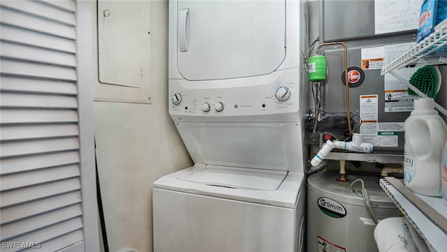 laundry room with stacked washer and dryer