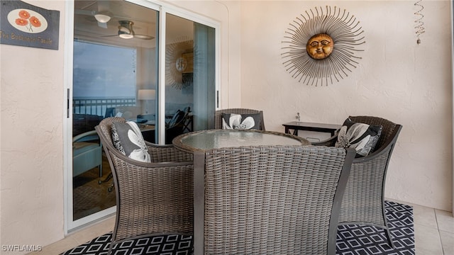 dining space featuring light tile patterned floors