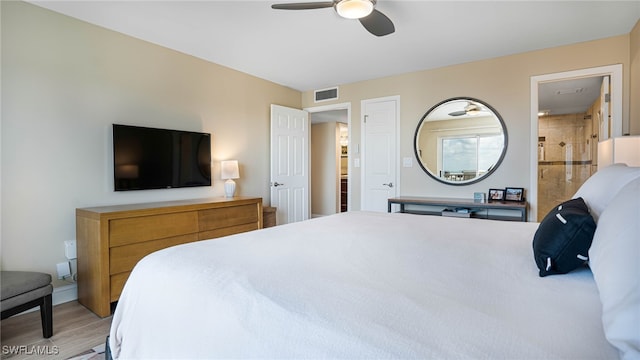 bedroom featuring light wood-type flooring and ceiling fan