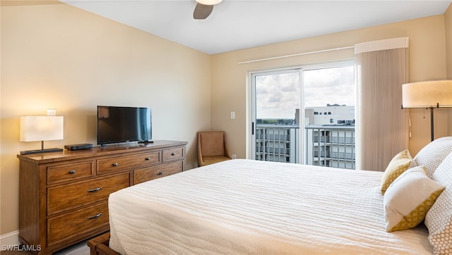 bedroom with access to exterior and ceiling fan