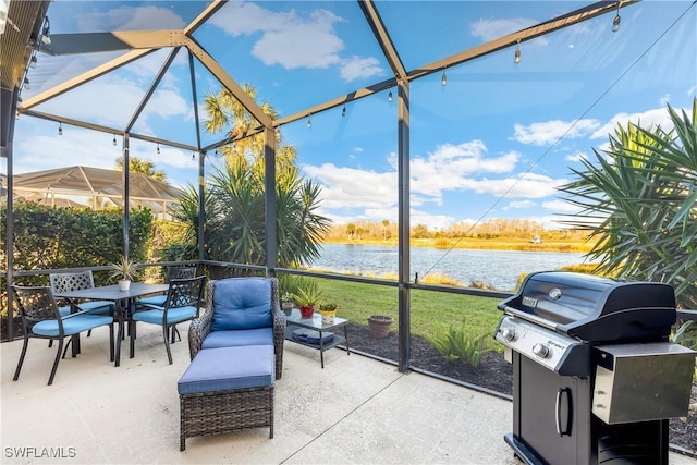 sunroom with a water view