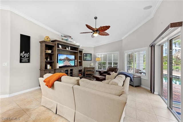 tiled living room featuring ceiling fan, ornamental molding, and lofted ceiling