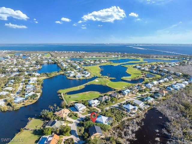 drone / aerial view featuring a water view