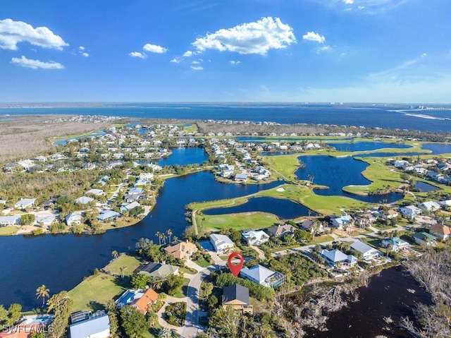 bird's eye view with a water view