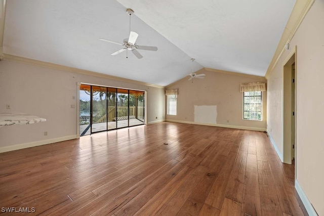 unfurnished living room featuring wood-type flooring, lofted ceiling, and ceiling fan