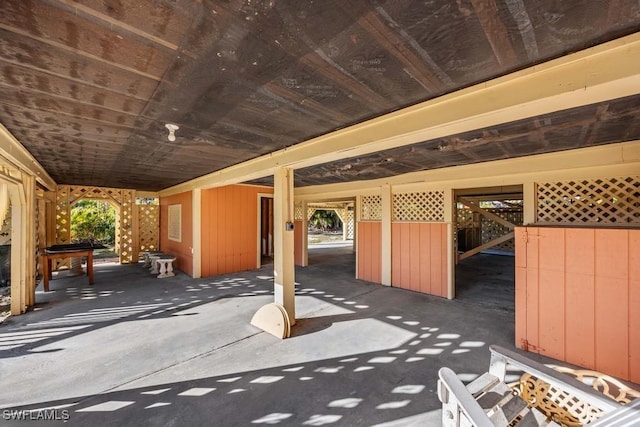 view of patio featuring an outbuilding