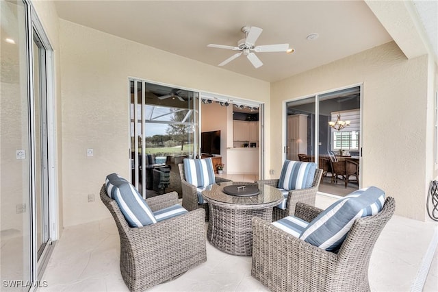 view of patio featuring ceiling fan