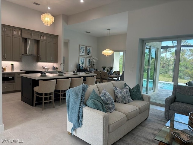 living room featuring an inviting chandelier