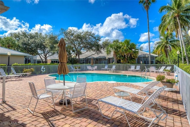 view of swimming pool featuring a patio area