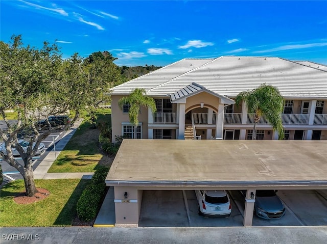 exterior space featuring a carport