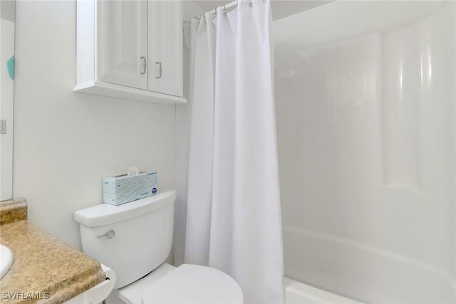 full bathroom featuring toilet, vanity, and shower / bath combo