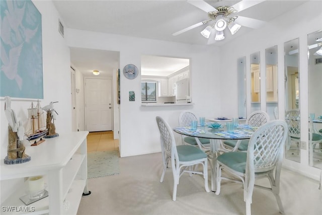 dining area featuring ceiling fan