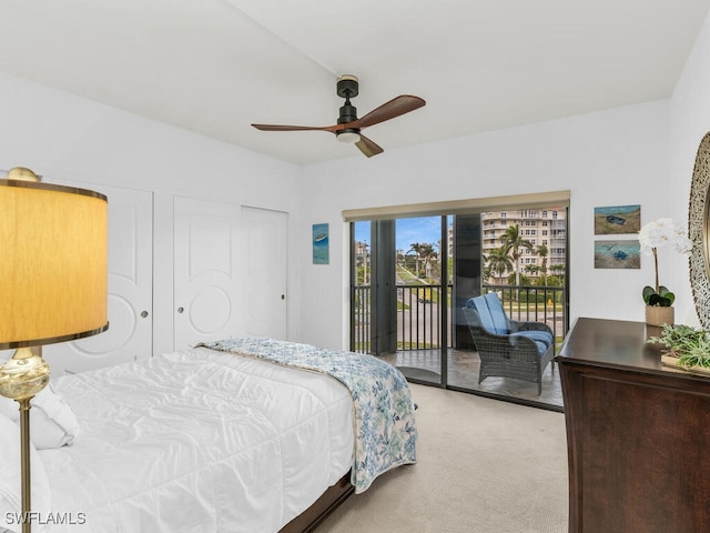 carpeted bedroom featuring ceiling fan and access to exterior