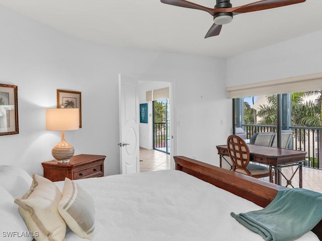 bedroom featuring light tile patterned floors and access to outside