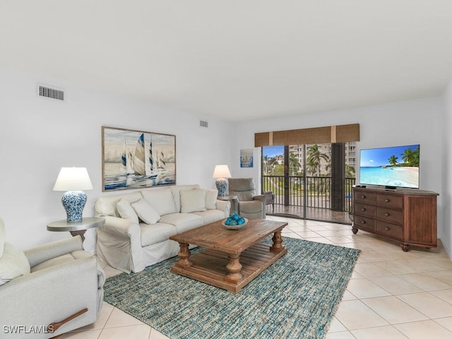 living room featuring light tile patterned floors