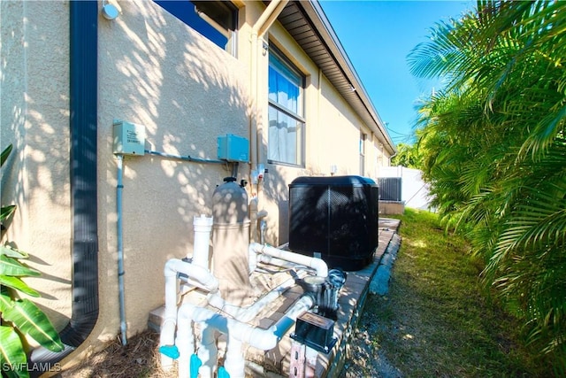 view of home's exterior featuring cooling unit