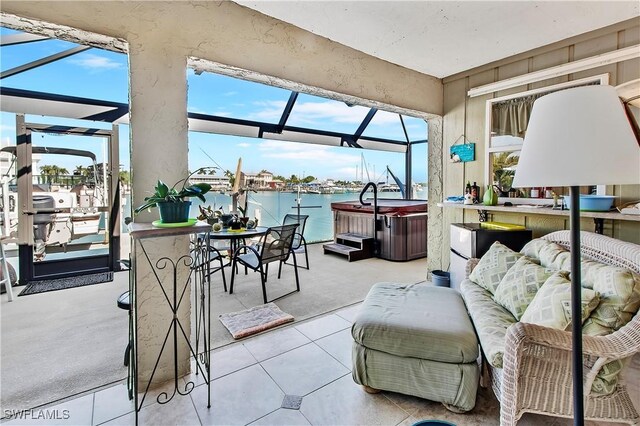 sunroom with a water view