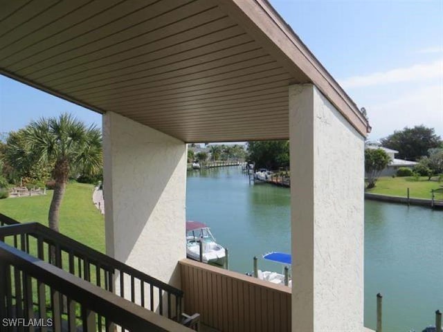 exterior space with a water view