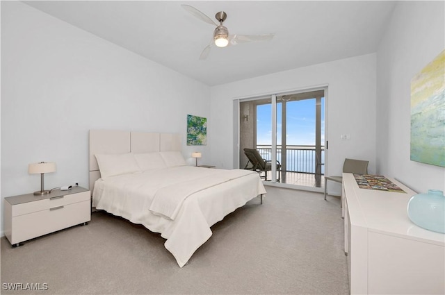 carpeted bedroom with ceiling fan and access to outside