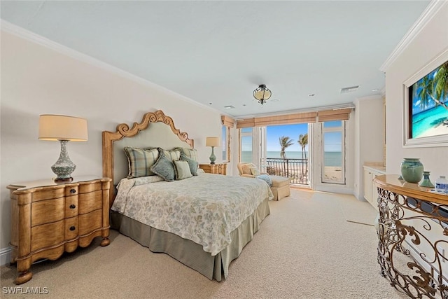 carpeted bedroom featuring access to exterior and ornamental molding