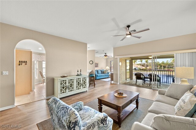 living room with light hardwood / wood-style floors and plenty of natural light