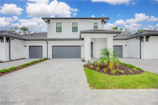 view of front of property with a garage