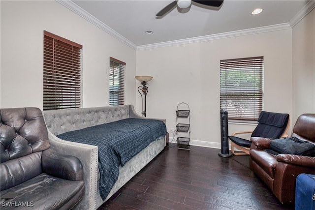 bedroom with ceiling fan, ornamental molding, and dark hardwood / wood-style floors