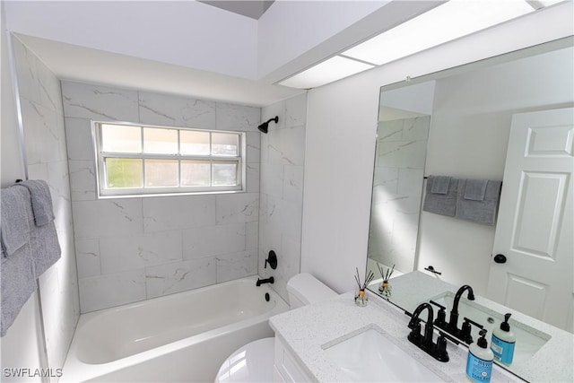 full bath featuring shower / bathing tub combination, vanity, and toilet