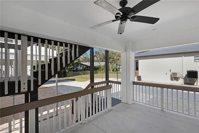 view of patio featuring central AC unit and ceiling fan