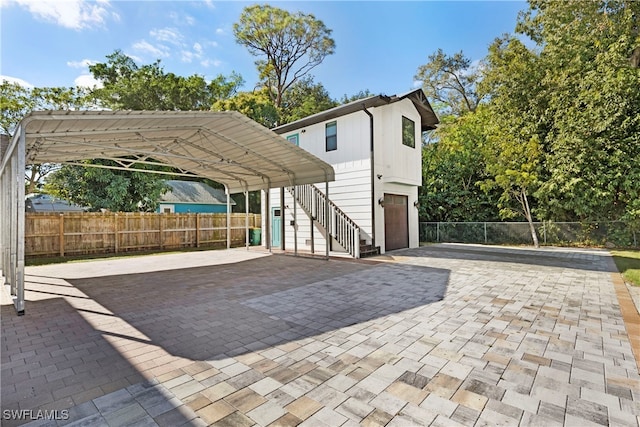 exterior space featuring a carport