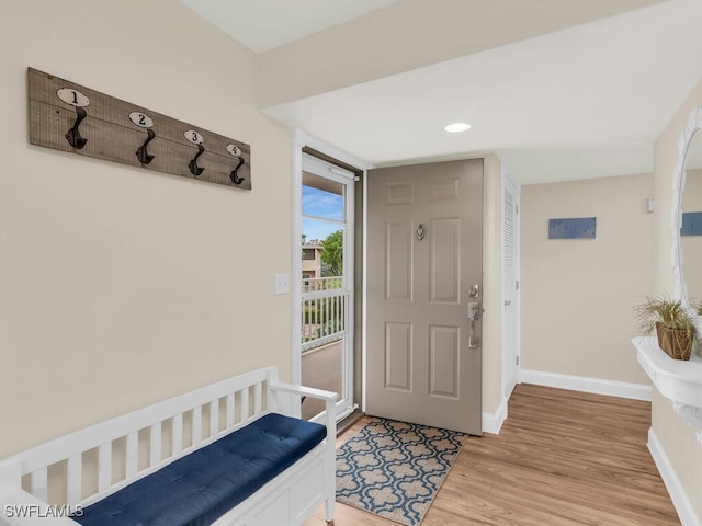 entryway with light hardwood / wood-style floors