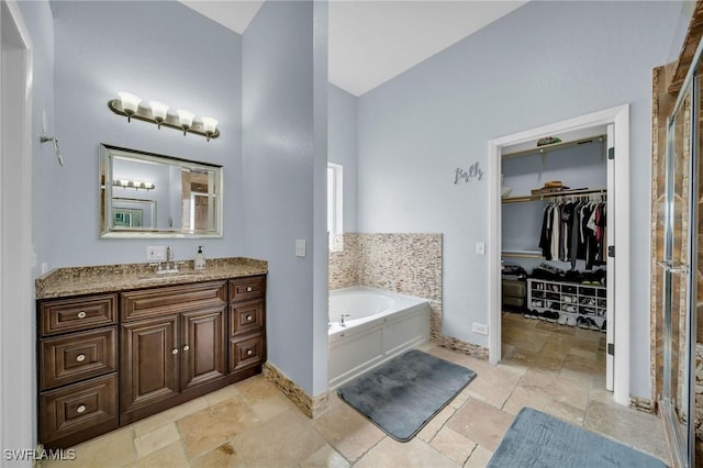 bathroom featuring vanity and a bathing tub