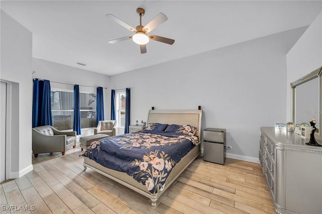 bedroom featuring ceiling fan and light hardwood / wood-style floors