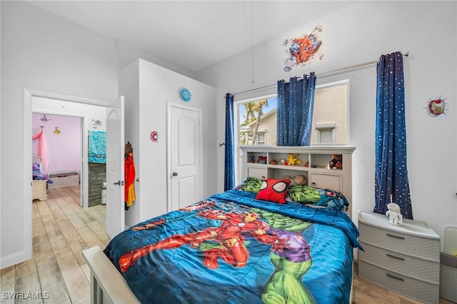 bedroom with light wood-type flooring