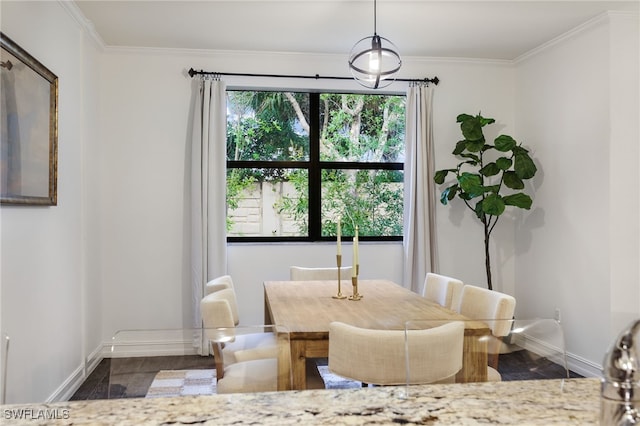 dining room with crown molding