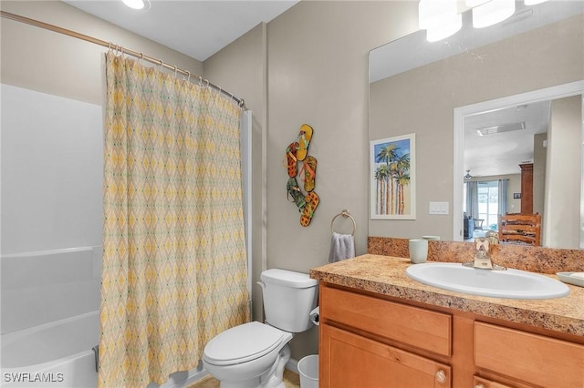 full bathroom with toilet, shower / tub combo, visible vents, and vanity