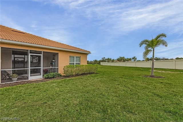 view of yard with fence