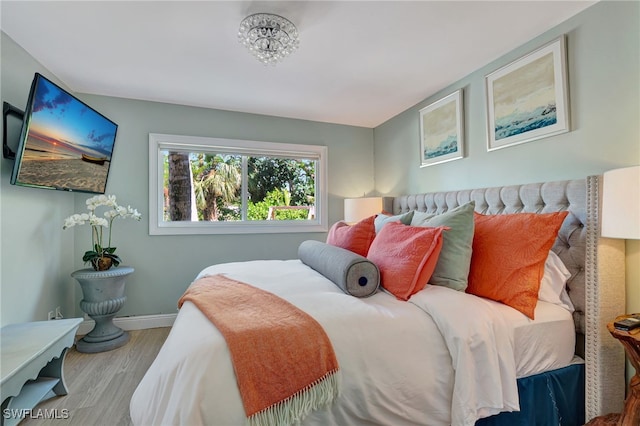 bedroom featuring light wood-type flooring